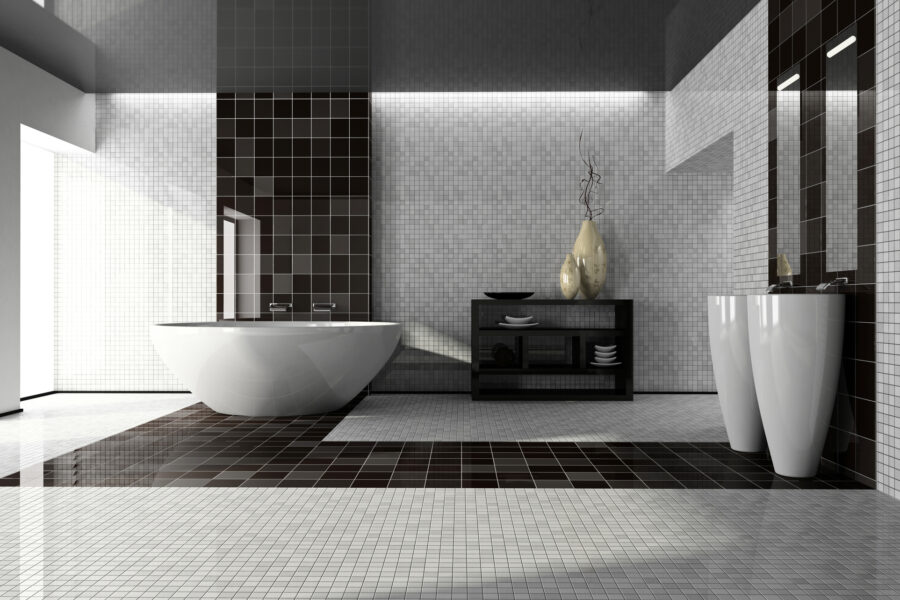 Salle de bains contemporaine habillée de petits carreaux noirs et blancs, avec baignoire îlot et carrelage mural en mosaïque